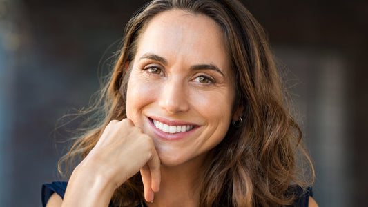 Menopause skincare tips: beautiful mature woman with glowing skin