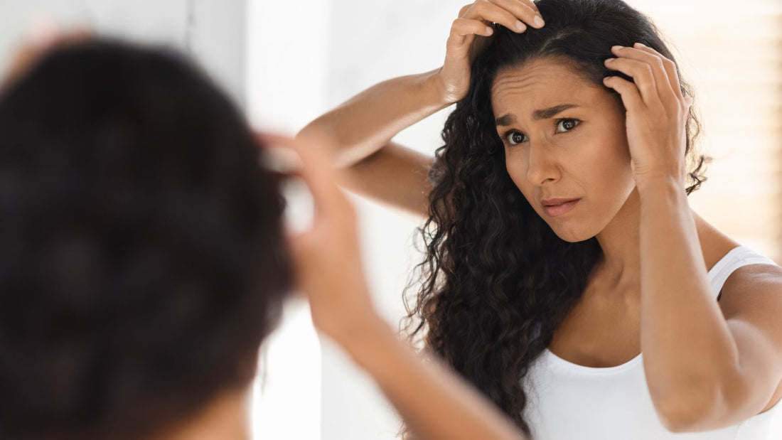 woman looking in the mirror