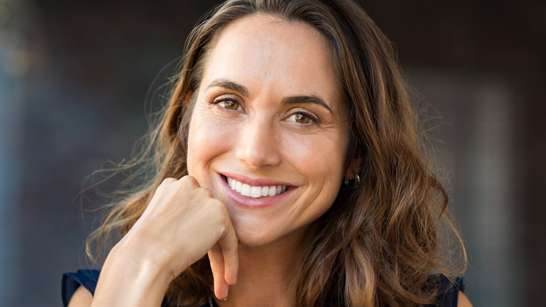 Menopause skincare tips: beautiful mature woman with glowing skin