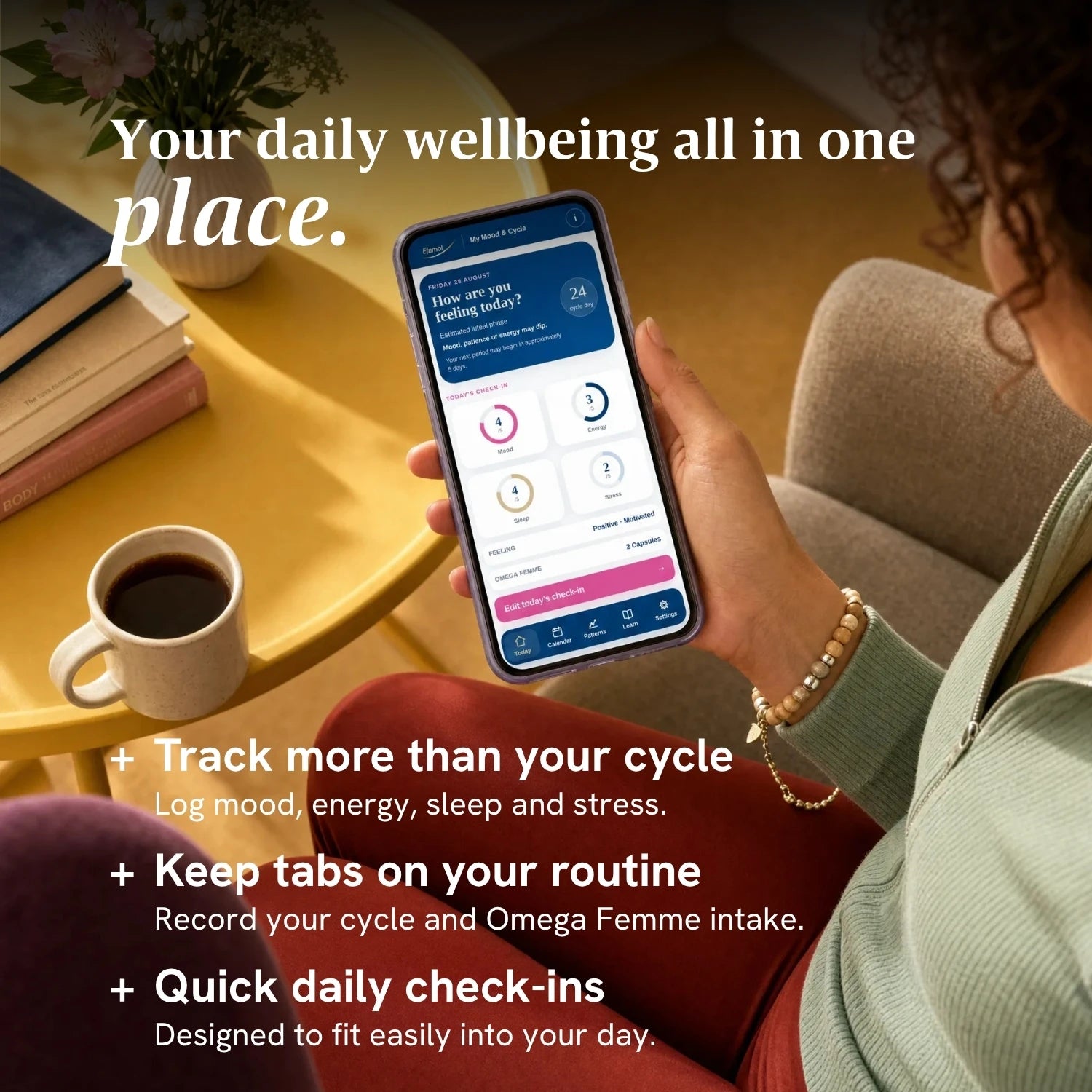 Efamol Mood & Cycle Tracker App in hand