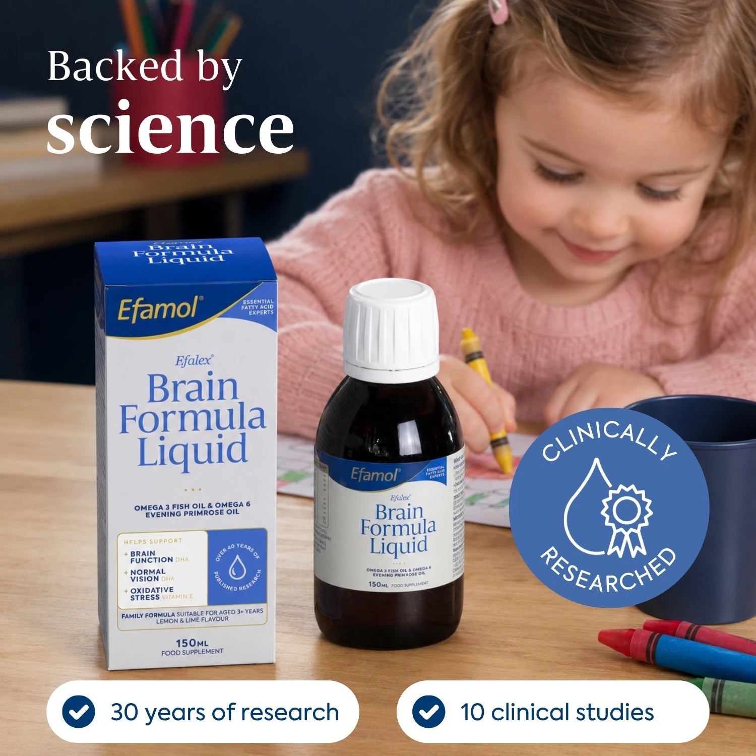 Efamol Brain Formula Liquid with packaging and a child writing in the background