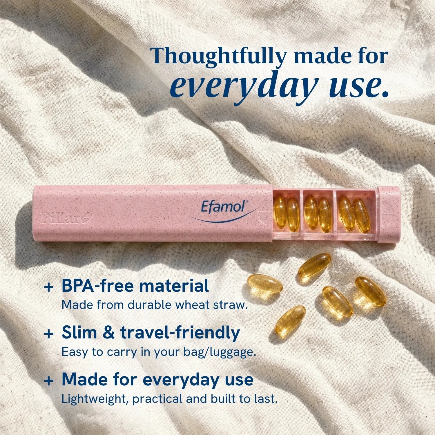 A pink Efamol travel pill case with several golden-yellow softgel capsules shown beside it on a textured cream fabric background, with promotional text above and below.
