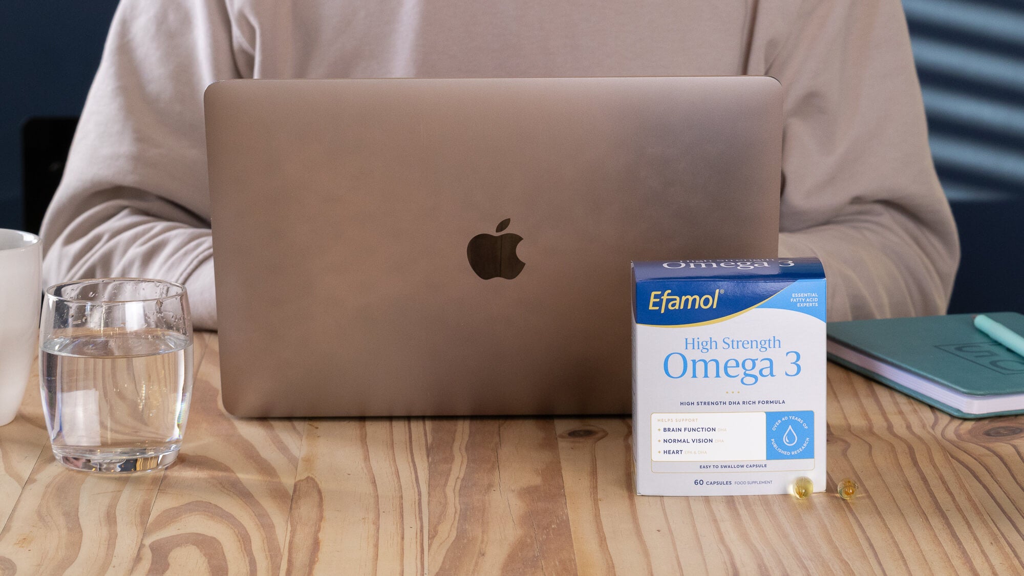 Efamol high strength omega 3 fish oil, man working